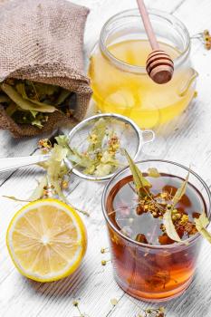 Antiviral Linden tea with honey and lemon