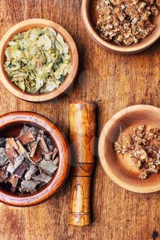drug collection Linden,hops and oak in wooden mortar