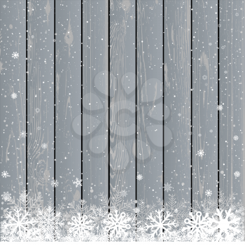 Christmas snow gray wood background. Winter snowflake wooden backdrop