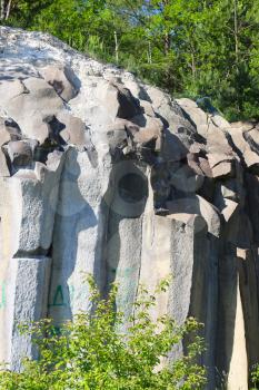 Large basalt stone columns background. Beautiful geological landscape