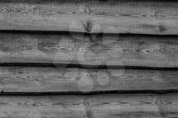 Black wooden boards background. Wall floor or fence exterior design. Natural wood material backdrop