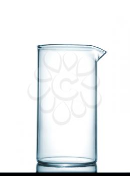 Isolated chemical beaker on table with a small reflection, studio shot