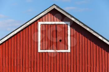 Classical Scandinavian architecture fragment, red wooden house