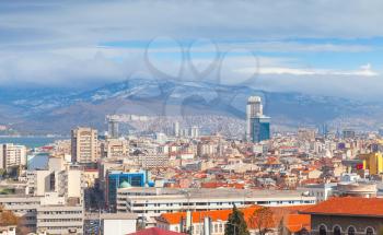 Panorama of Izmir city, Turkey. Modern buildings and mountains on a horizon