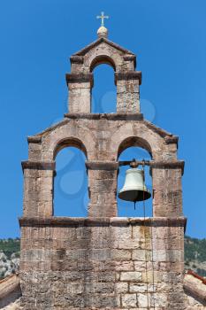 Serbian Orthodox Church bell tower in Petrovac town, Montenegro