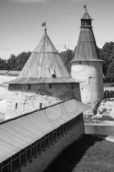 Stone towers of old fortress. Kremlin of Pskov, Russia. Classical Russian ancient architecture