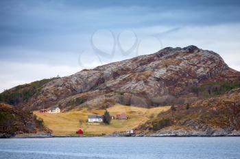 Traditional small Norwegian coastal village with wooden houses