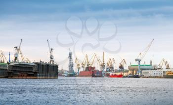 Industrial panorama with cranes and docks. Big Neva River in St.Petersburg, Russia