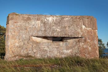 Old concrete bunker from WW2 period on Totleben fort island in Russia