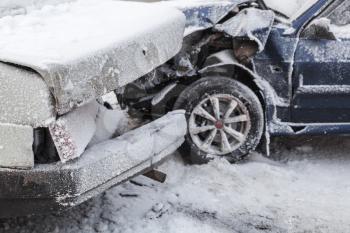 Car crash accident on winter road with snow