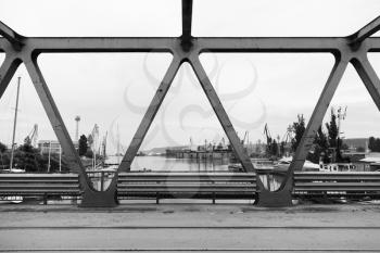 Truss bridge fragment. Abstract steel construction black and white photo