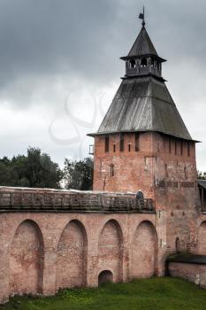 Novgorod Kremlin also known as Detinets. Tower and walls under cloudy sky. It was built between 1484 and 1490. World Heritage Site