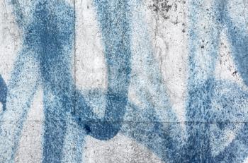 Abstract blue urban graffiti lines over old gray concrete wall