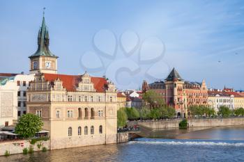 Old Prague view in summer day. Vltava river, Smetana Museum in the former waterworks and old water tower. Czech Republic