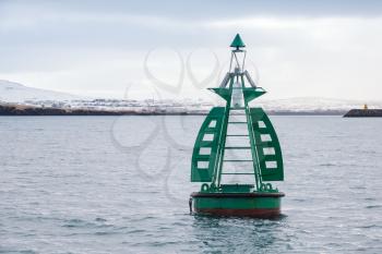 Green framed buoy. Navigation equipment of Reykjavik, Iceland
