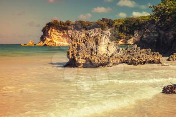 Rocks of Macao Beach, vintage toned coastal landscape of Dominican Republic, Hispaniola Island