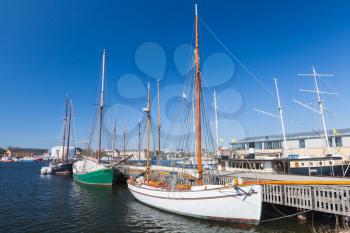 Vintage sailing yachts moored in Stockholm city, Sweden