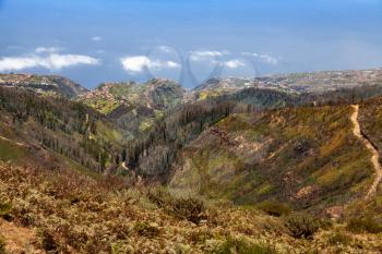 Coastal mountain landscape with small villages. Madeira Island, Portugal