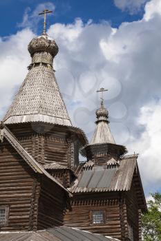 Ancient Russian wooden Orthodox church under cloudy sky, Veliky Novgorod, Russia