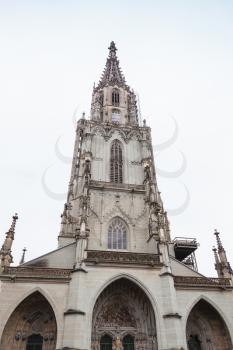 Bern Minster facade. It is a Swiss Reformed cathedral, in the old city of Bern, Switzerland. Built in the Gothic style, its construction started in 1421