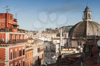 Skyline of Old Rome, Italy. Via del Corso street view, photo taken from the roof, looking at The Piazza del Popolo with dome of Basilica Santa Maria di Montesanto as a dominant landmark