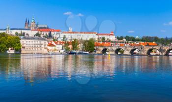Czech Republic, panoramic view of Old Prague with St. Vitus Cathedral and Charles Bridge.