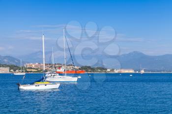 Sailing yachts and motorboats moored in bay of Ajaccio, Corsica island, France