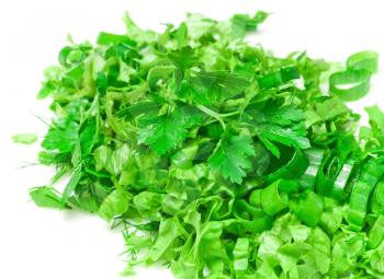 Fresh chopped greens isolated on white closeup background