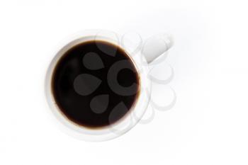 White cup full of black coffee stands on the table with soft shadow. Top view, soft shadow