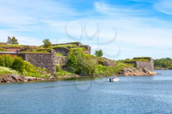 Suomenlinna fortress in a summer day. It is a World Heritage site and popular with tourists and locals. Helsinki, Finland