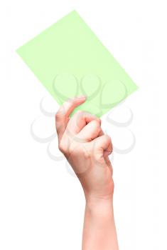 Female hand with empty light green card isolated on white