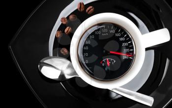 Coffee cup with speedometer, metaphor of people acceleration 