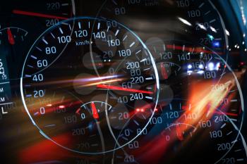 Abstract night racing illustration with blurred lights and speedometers