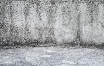 Empty Interior background texture with dark ancient gray concrete wall and floor made of stone