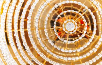 Abstract colorful background with crystal glass design elements of round vintage chandelier