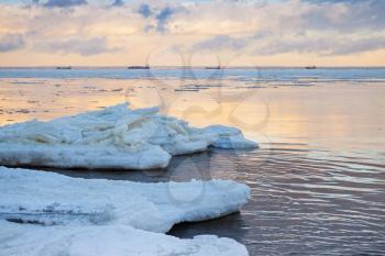 Winter coastal landscape with big ice fragments, covered with snow. Gulf of Finland, Russia