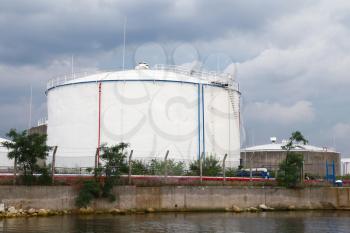 Big white oil tank on the sea coast in Varna port