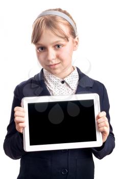 Little blond girl with tablet device on white background