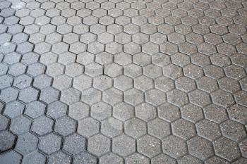 Background texture of gray city cobblestone road