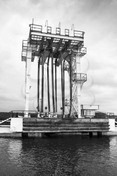 Oil terminal. Equipment for tankers loading on the pier, black and white photo