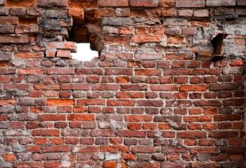 Vintage detailed brick wall texture with hole