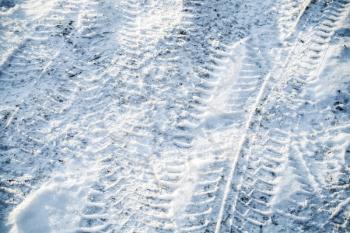 Background texture of snowbound urban road