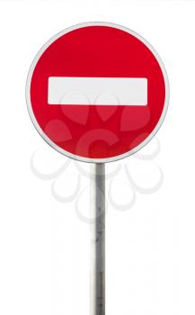 Round red road sign on metal pole. No Entry road-sign isolated on white