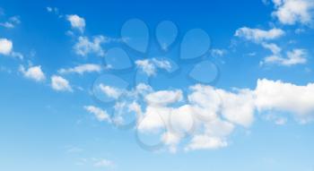 Blue sky with white altocumulus clouds, panoramic nature background photo texture