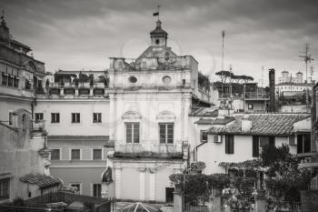 Skyline of old Rome, Italy. Via del Corso, retro stylized black and white street view photo