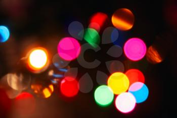 Colorful blurred lights, bokeh effect. Abstract photo background