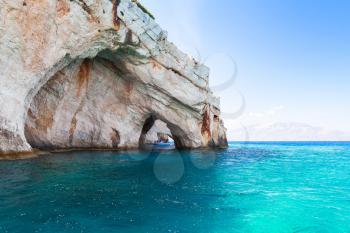 Blue caves, coastal rocks of Greek island Zakynthos with natural stone arches