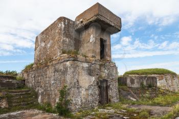 Facade of an old abandoned concrete bunker from WWII period on Totleben fort island near Saint-Petersburg city in Russia