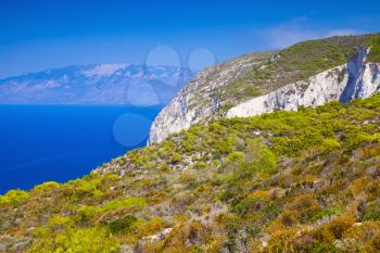 Navagio bay, Greece, coastal landscape. Rocks under blue sky, natural landmark of Greek island Zakynthos