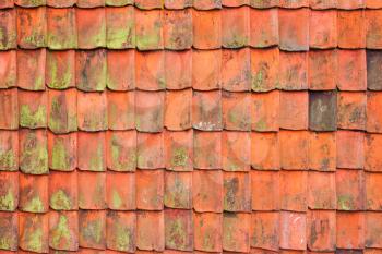 Vintage red roof tiling, frontal background photo texture